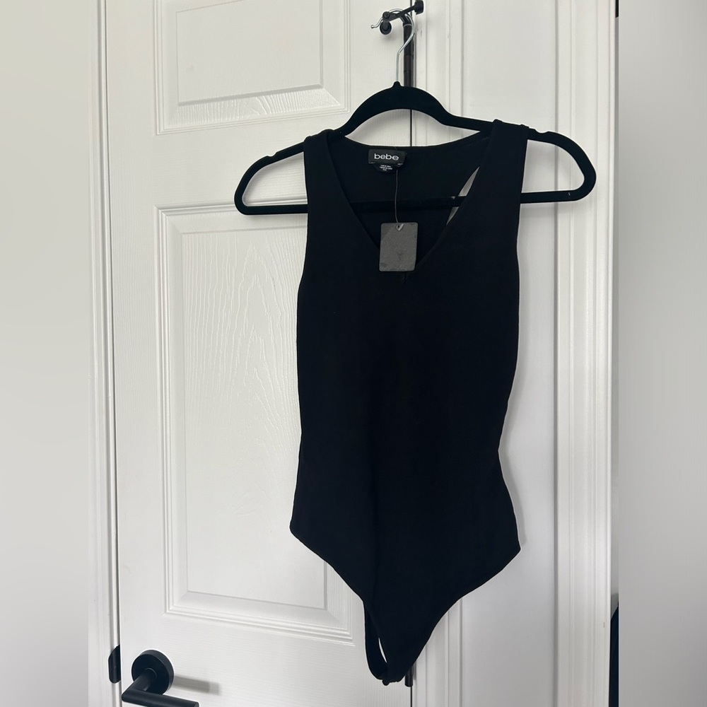 Bebe bodysuit w/ cut out sides